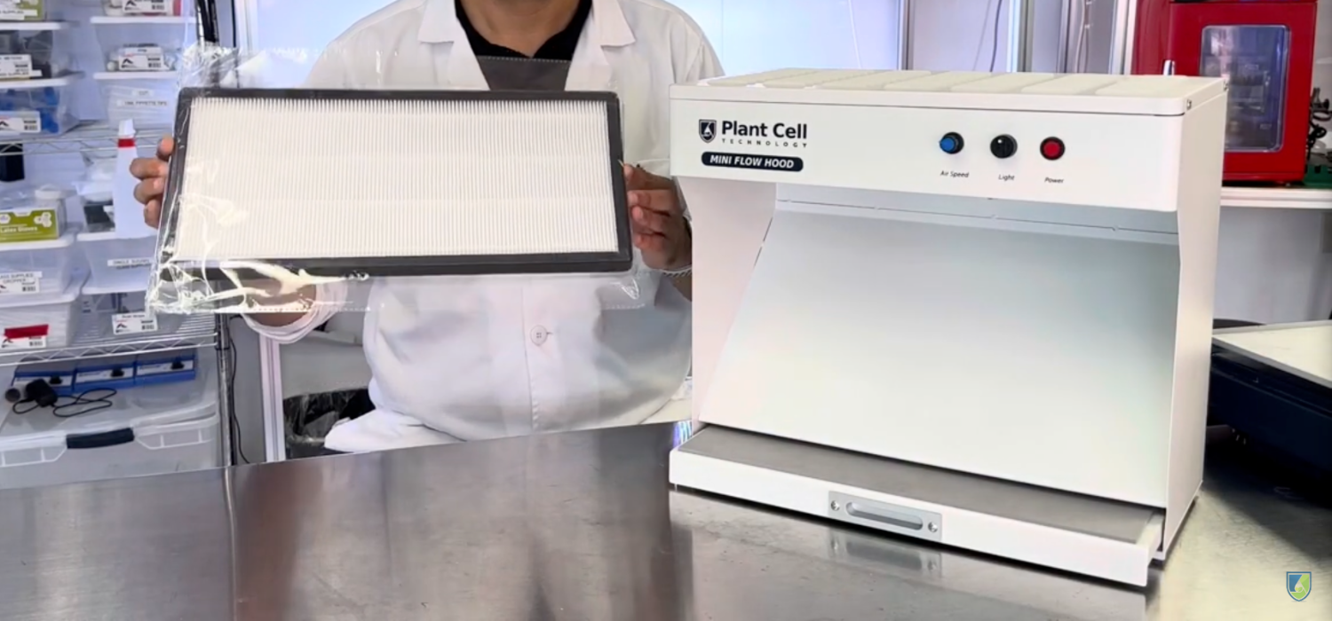 Photo of 'The Mini' laminar flow hood featuring its sleek design and HEPA filter, ideal for creating a sterile environment in compact or portable lab spaces.